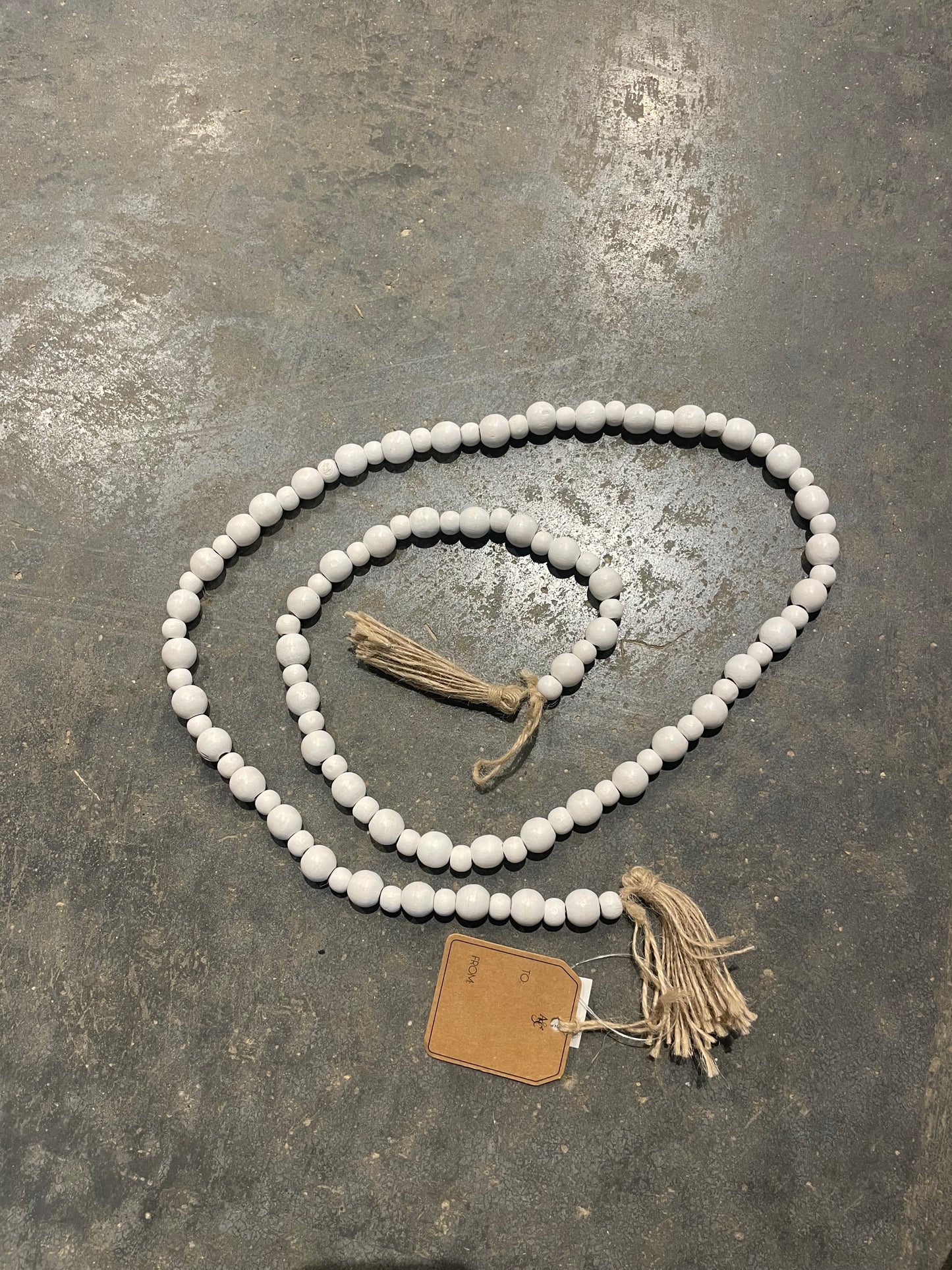 48” White Bamboo Wood Garland w/ Tassels