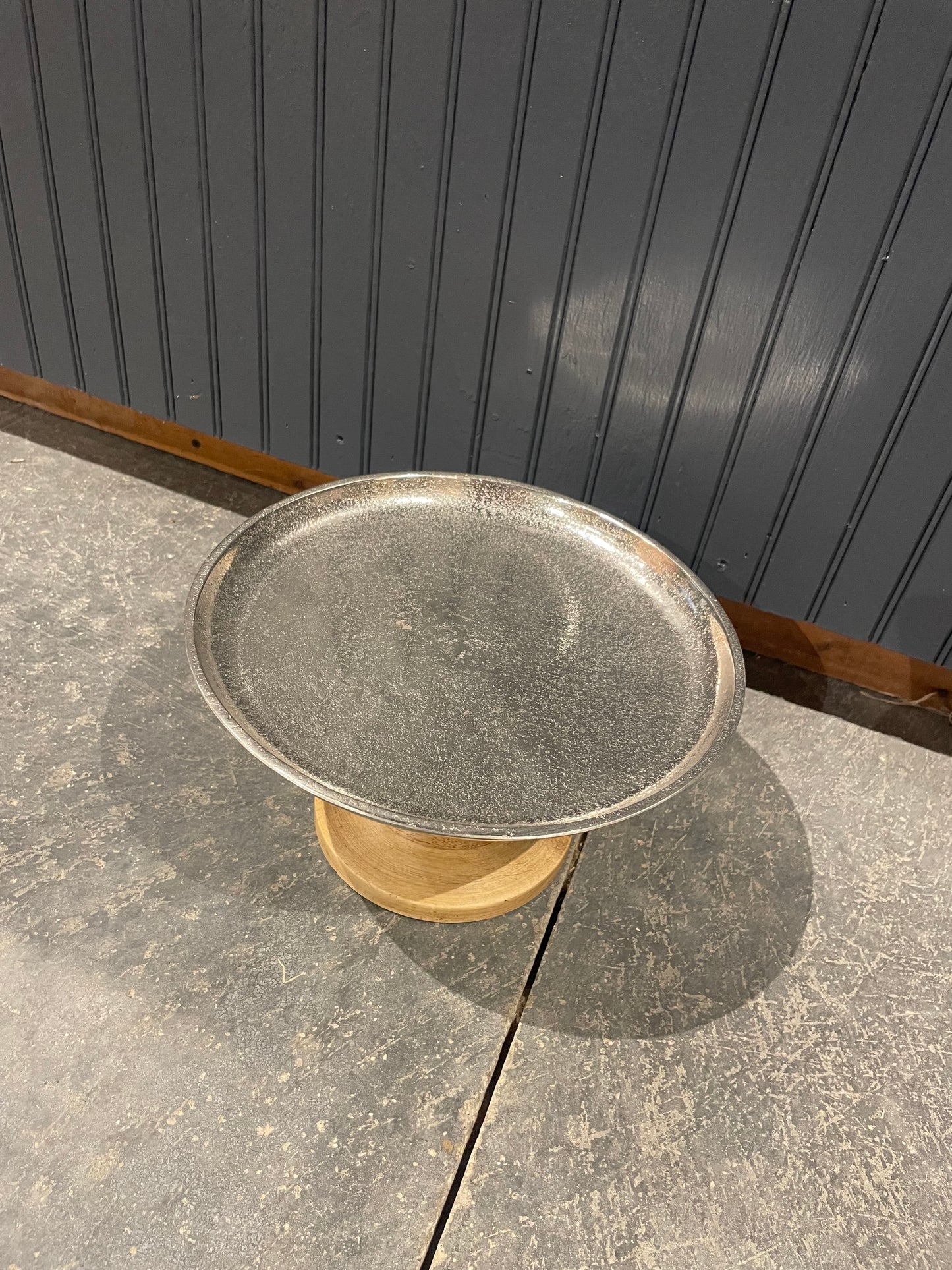 Wood pedestal with round silver tray top