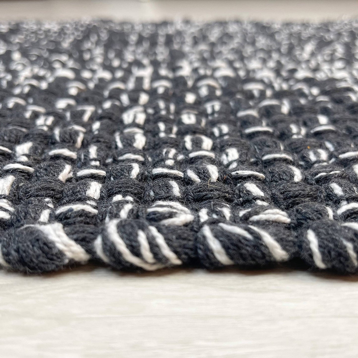 WAFFLE RUG, BLACK/WHITE, 21'' x 34''.