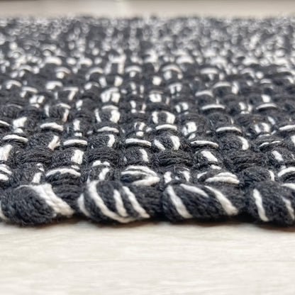 WAFFLE RUG, BLACK/WHITE, 21'' x 34''.